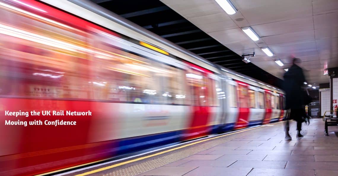 A motion-blurred London Underground train speeding through a brightly lit station platform, with a person walking along the edge. Text on the image reads “Keeping the UK Rail Network Moving with Confidence.” Represents Rail Maintenance & Repair Services ensuring smooth and reliable train operations.